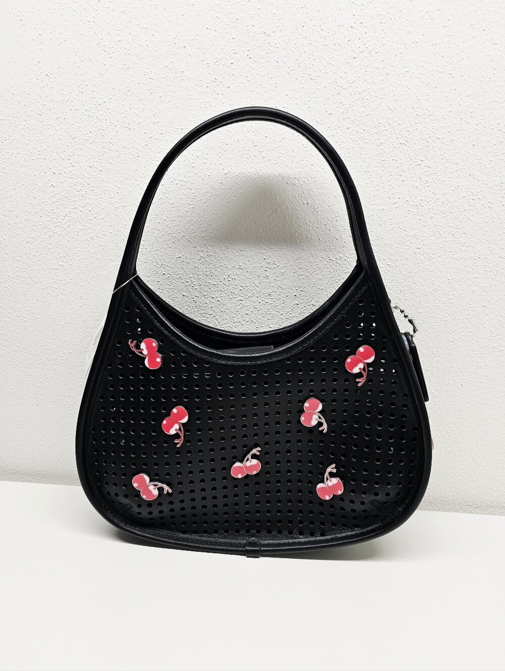 Coachtopia Black Mini Ergo Bag in Perforated Leather with Cherries